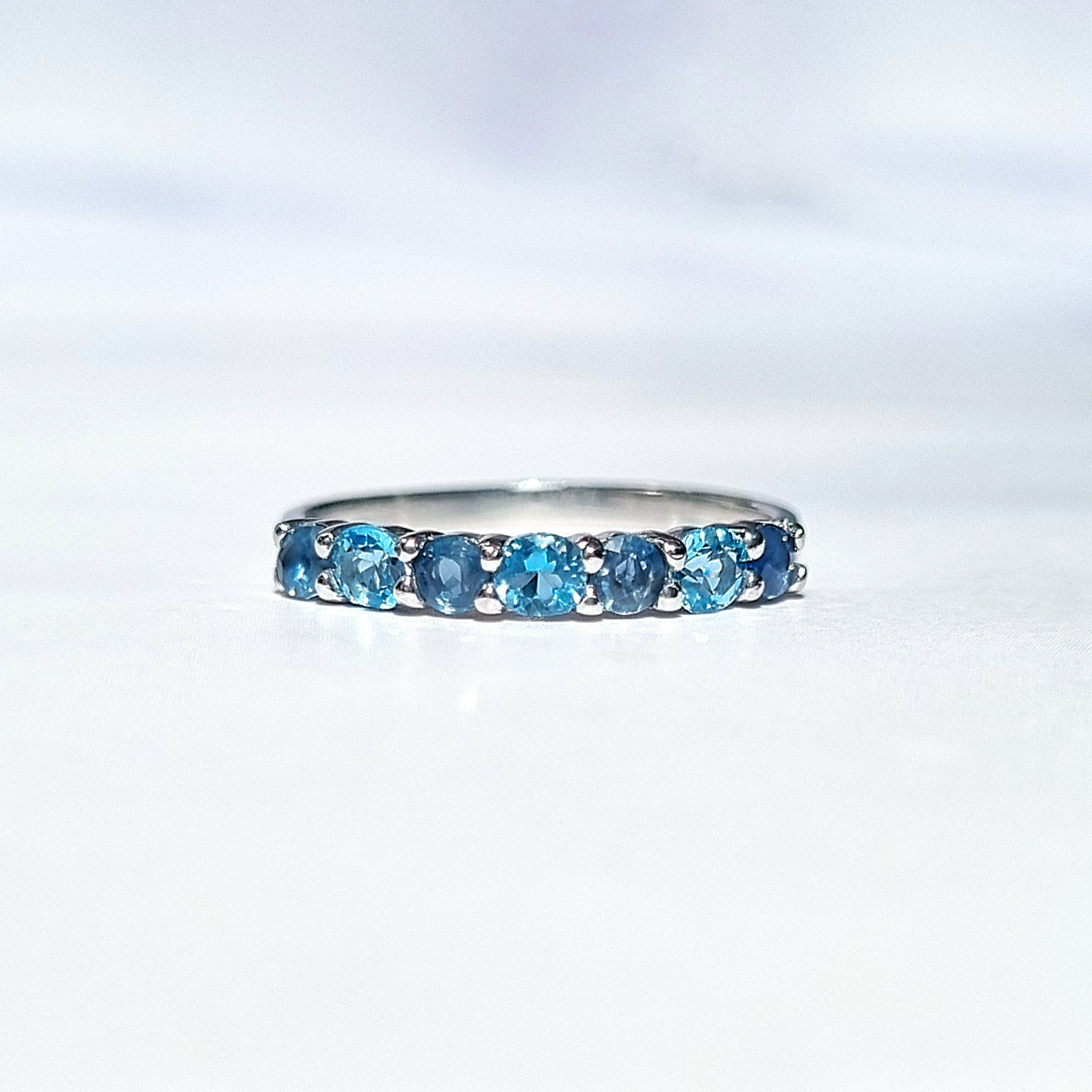 Blue Sapphire & Blue Topaz Half Eternity Band in