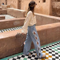 Jean étoile à taille haute et jambe large pour femme